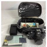 Nikon EM SLR 35mm Camera with 50mm Nikon Series E Lens and Flash