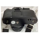 Nikon EM SLR 35mm Camera with 50mm Nikon Series E Lens and Flash