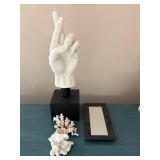 White Hand Sculpture on Black Base with Coral Accents and Display Mirror Frame