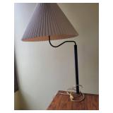 Lamp on Oak End Table with Beige Pleated Shade