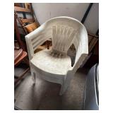 Four White Stackable Plastic Outdoor Chair