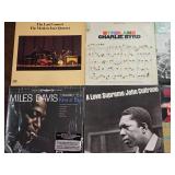 Jazz Vinyl Record Collection Featuring Miles Davis and John Coltrane