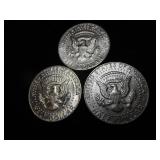 Nine Kennedy Half Dollars