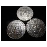 Nine Kennedy Half Dollars