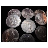 Seventeen Presidential Dollar Coins