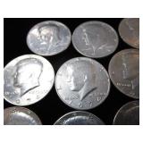 Fourteen Kennedy Half Dollars