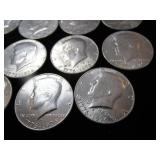 Fourteen Kennedy Half Dollars