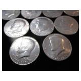 Thirteen Kennedy Half Dollars