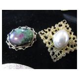 Seven Brooches / Pins