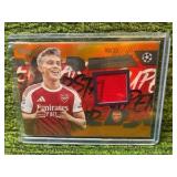 2025–26 Topps Superstar Relic card from UEFA Club Competitions Player Worn LEANDRO TROSSARD Arsenal FC Orange/25 Insert