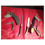 4 knives, 3 letter openers, and a knife sharpener