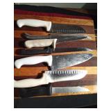 Vintage cutting board with a pull-out drawer of vintage Chicago Cutlery knives and more