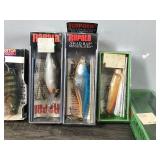 Lot of 4 Fishing Lures in the Box and 1 Empty Rapala Box
