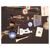 Vintage watches, advertisement key chains, cuff links, pins vintage souvenir folding cup, noise maker toy and more