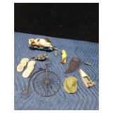 Wood drink tokens, metal bicycle, metal mini fishing net, wood cat on hay trailer, parrot, fish, boat and bird