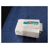 Ecolab Pathways drain treatment dispenser with key and a plug-in timer