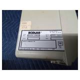 Ecolab Pathways drain treatment dispenser with key and a plug-in timer