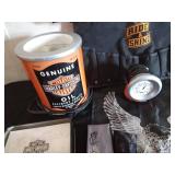 Harley Davidson items: Ring, lamp, tool bucket belt, stationary set in tin, helmet bag headbands and a motorcycle angel pin