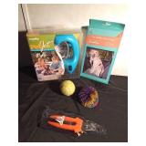 Pet Jet (to wash your pet), pet car restraint, clippers, toys