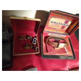 Realistic pocket vision LCD TV with manual, Waltham Watch in original case with manual, cuff links, vintage coin purse, lighter, and vintage manicue set