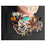 Heart shaped with rose on top full of jewelry