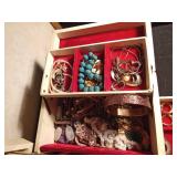 Vintage jewelry box full of jewelry