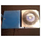 Record book of 45s vinyl records