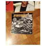 Vintage vinyl album records including half sealed Steppenwolf and never been out of the package