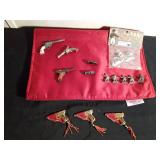 3 Miniature metal guns, 3 miniature metal guns in holsters with gems on butt of guns and 1975 custom cast metal historical figures