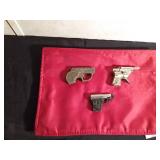 1965 metal multi pistol 09 cap gun by Topper Toys, vintage HAWK tin toy cap gun, vintage metal pencil sharpener pistol