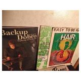 Music books- Mostly guitar and Harmonica playing