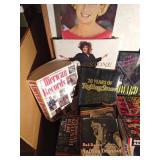 Tote of books about famous people, corvettes, tractors and more