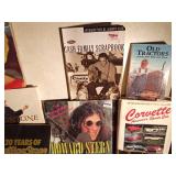 Tote of books about famous people, corvettes, tractors and more