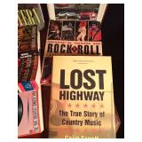 Tote of books about famous people, corvettes, tractors and more