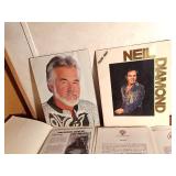 Kenny Rogers 10th Anniversary picture book, Neil Diamon 1987 tour book, Songwriter Ellis Paul story and1995 photo, Story and 1992 photo of Rodney Crowell