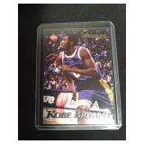 3 Kobe Bryant basketball cards in sleeves