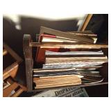 2 Magazine racks full of magazines and maps - Mad, mother earth news, Fur-fish game, Gopher Historian. Life, 911 newspapers and more