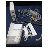 Wii with controllers and cords and manual