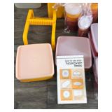 Lot of Vintage Tupperware - The Tupper Ware in the Front of the box is a set and it’s never been used (has original box and Manual)