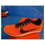 Size 11/12.5 Nike Zoom Rival D 10 track and field spikes in the "Bright Mango" colorway.