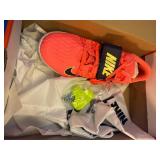 Size 11.5/13 Nike Triple Jump Elite athletic shoe box, with a listed retail price of USD $125.00