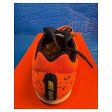 Size 10.5/12 Nike Zoom Rival D 10 distance spikes in the bright mango and blackened blue colorway.