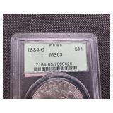 1884 O PCGS MS 63 Morgan Silver Dollar
