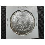 1885 Morgan Silver Dollar Marked MS 63+ when purchased