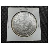 1885 Morgan Silver Dollar Marked MS 63+ when purchased