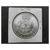 1885 Morgan Silver Dollar Marked MS 63+ when purchased