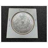 1887 Morgan Silver Dollar Marked MS 62 when purchased