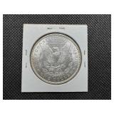 1887 Morgan Silver Dollar Marked MS 62 when purchased