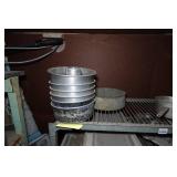 Industrial Rolling Shelf with Large Assortment of Cake and Bread Pans