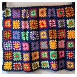 Vintage Crocheted Granny Square Afghan – Multicolor Floral Motifs on Navy Ground